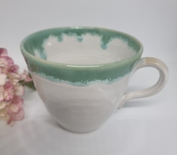 Kopp i hvit og turkis