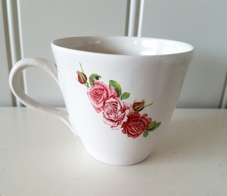 Kopp med rosa roser