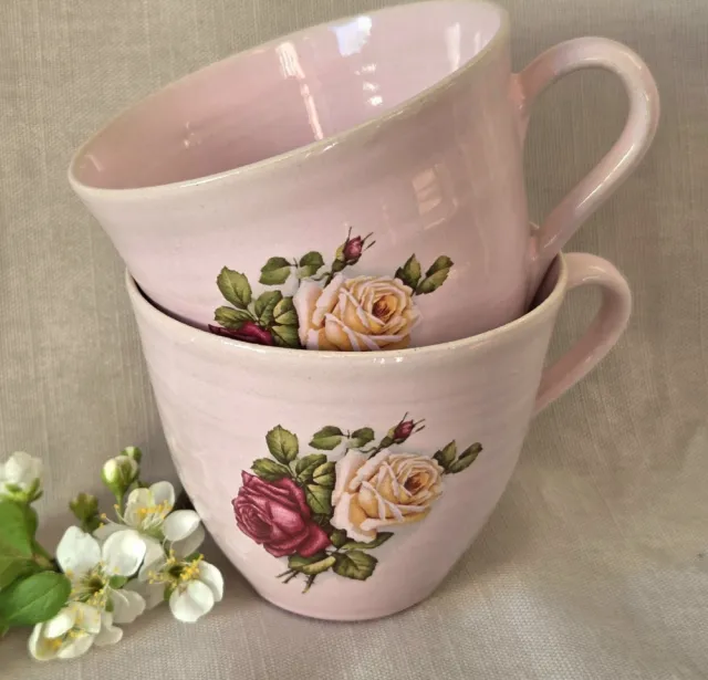 Rosa kopp med roser 